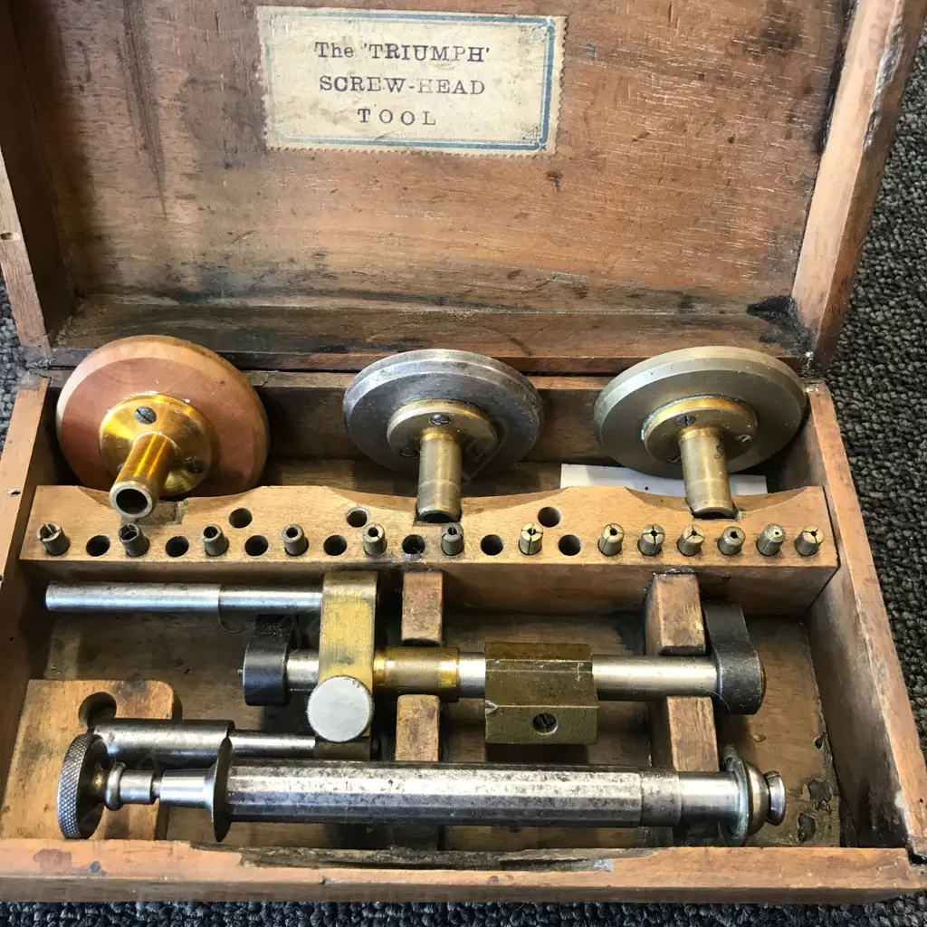 BOXED SCREW HEAD POLISHING TOOLS (2) AND BOXED SWISS 'FAVORITE' MAINSPRING WINDER SET Image 1++